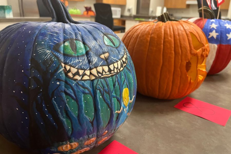English teacher Vanessa Melvin was the creative mind behind the English departments pumpkin. She chose to focus on Alice in Wonderland to bring in the creative aspect, but also tie the theme back to English.
