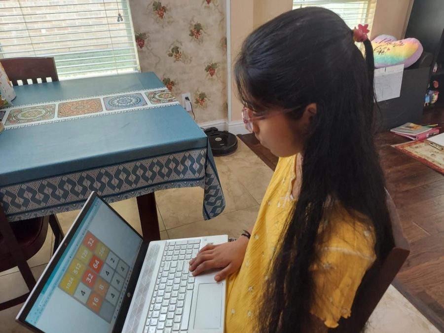 To many students, the infamous game 2048 is impossible to play, but to freshman Medha Pedaprolu, all it takes is a couple of pauses and a few swipes of the thumb to beat the game. Pedaprolu plays frequently, and can now reach 2048 on a regular basis making the game less of a casual activity and more of a full on commitment.
