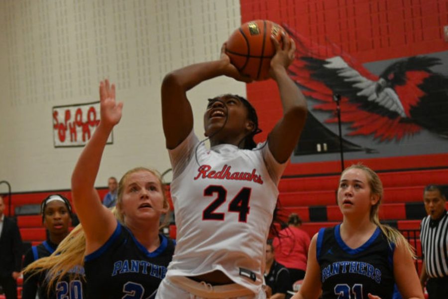 The Redhawks girls basketball team saw a win over the Centennial Titans on Friday at The Nest. The win holds the teams first place rank in District 10-5A, and brings their record to 7-1.