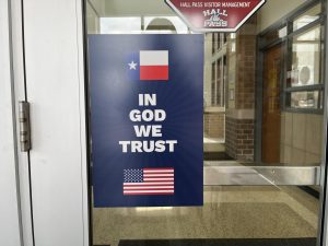 All Texas public schools must post donated posters featuring the national motto In God We Trust as a result of Senate Bill 797. For some, the poster reminds students of Americas history while for others, the poster drives focus away from educational needs. 