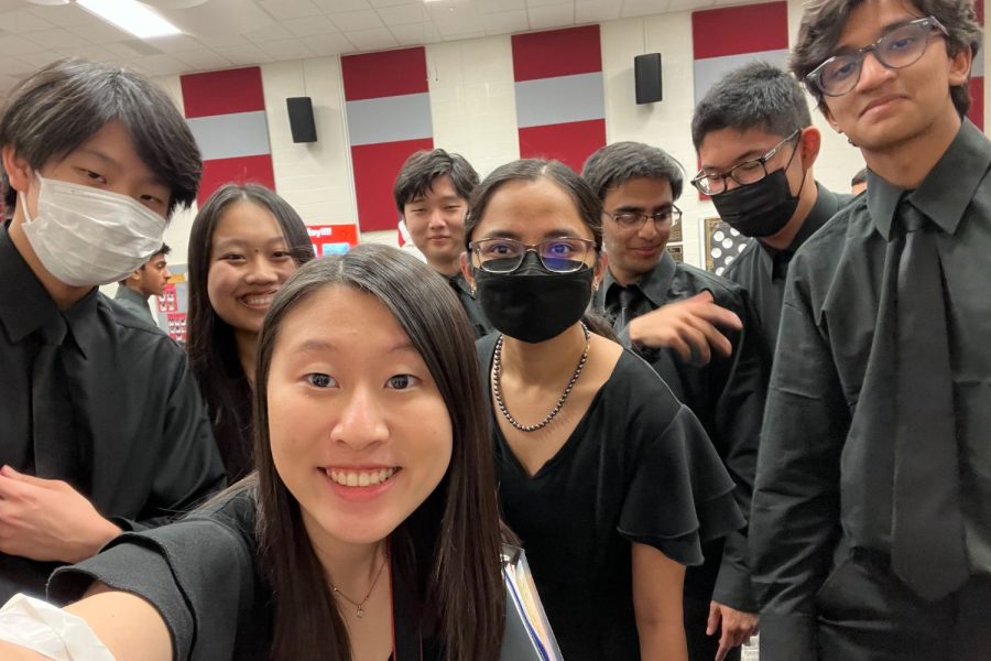 Junior Adler Xu (pictured left) takes a selfie with his peers after the fall concert. In this weeks edition of Artistic Expressions, Wingspan sits down with Xu as he discusses his journey as a musician.