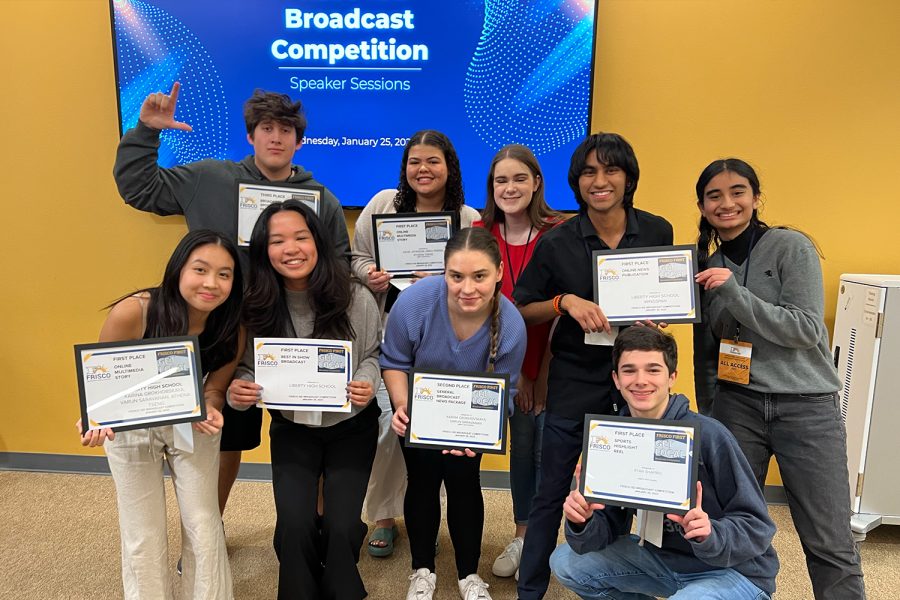 An array of Wingspan staff members hold up their awards after competing at the 2nd Annual Frisco ISD Journalism Competition Tuesday and Wednesday at the CTE Center. The team was able to earn several honors, including Best Website and Best of Show. 