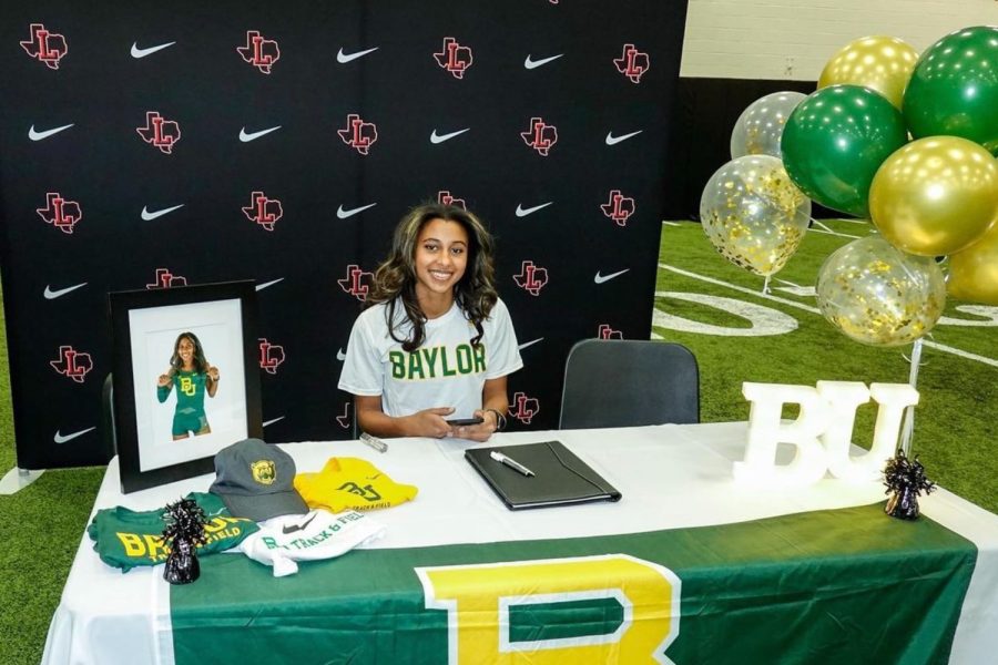 Senior+Bella+Copeland+is+trading+red+and+black+for+green+and+gold+with+her+commitment+to+Baylor+University+for+Track+and+Field.