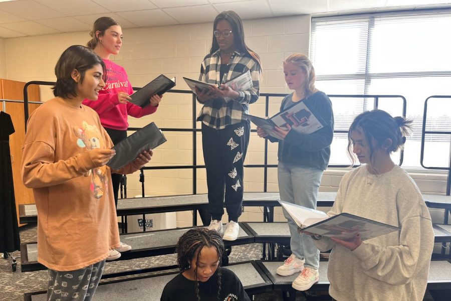 This week on Artistic Expressions, staff reporter Sarayu Bongale sits down with junior choir student, Ruhi Ali (pictured far right). 