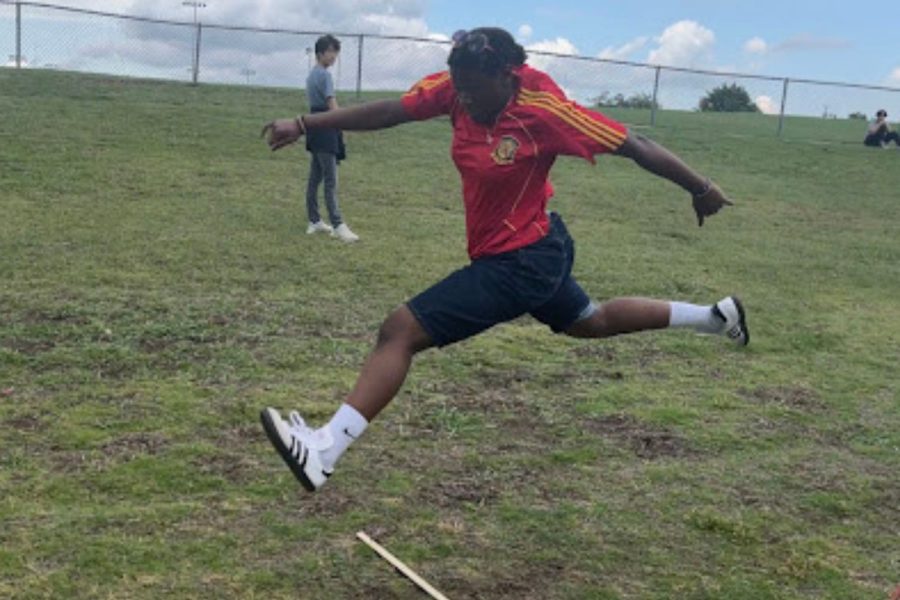 AP Environmental Science students are ending off the year with a field day. Junior Judith Aluga (pictured above) played the 3 stick challenge.