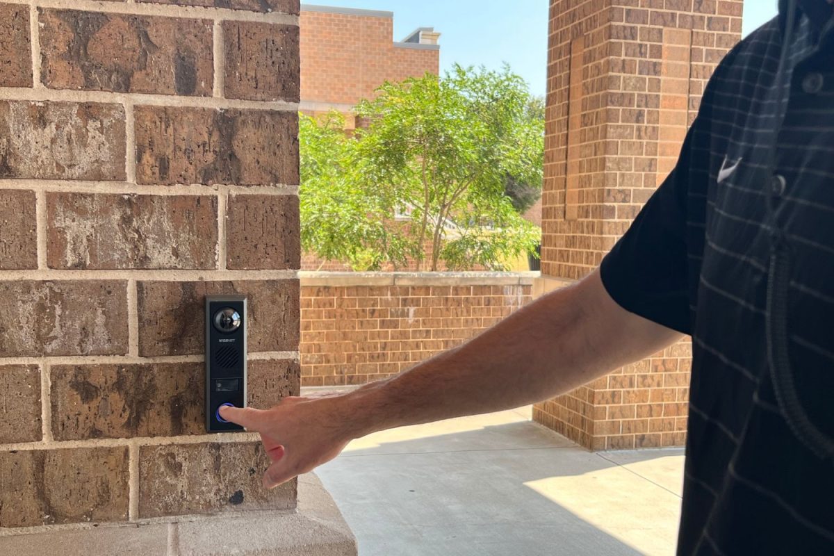 Changing up campus protocols, there is now a doorbell at the front door. In order to enter, parents and students must ring the doorbell and present their ID.