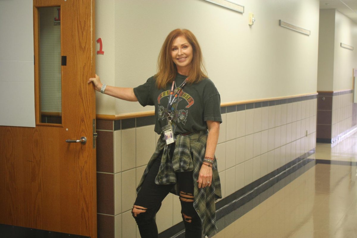 English teacher Shannon Smith is wearing a popular 90s band shirt.