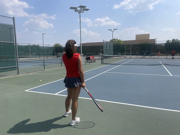 Tennis waves goodbye after competing in the District tournament on Thursday and Friday. Even though the group will not be advancing, the team still found some successes on the court.