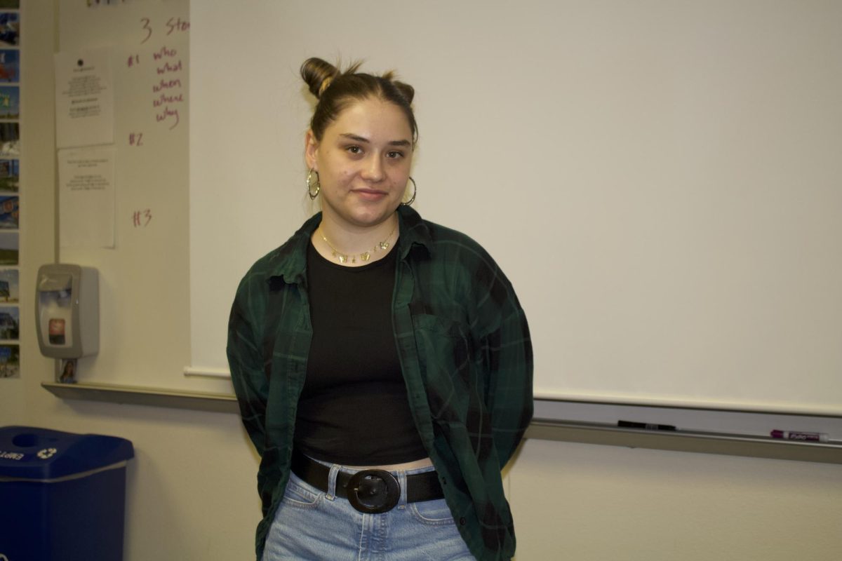 Senior Karina Grokhovskaya is wearing a flannel, a common style in the 90s.