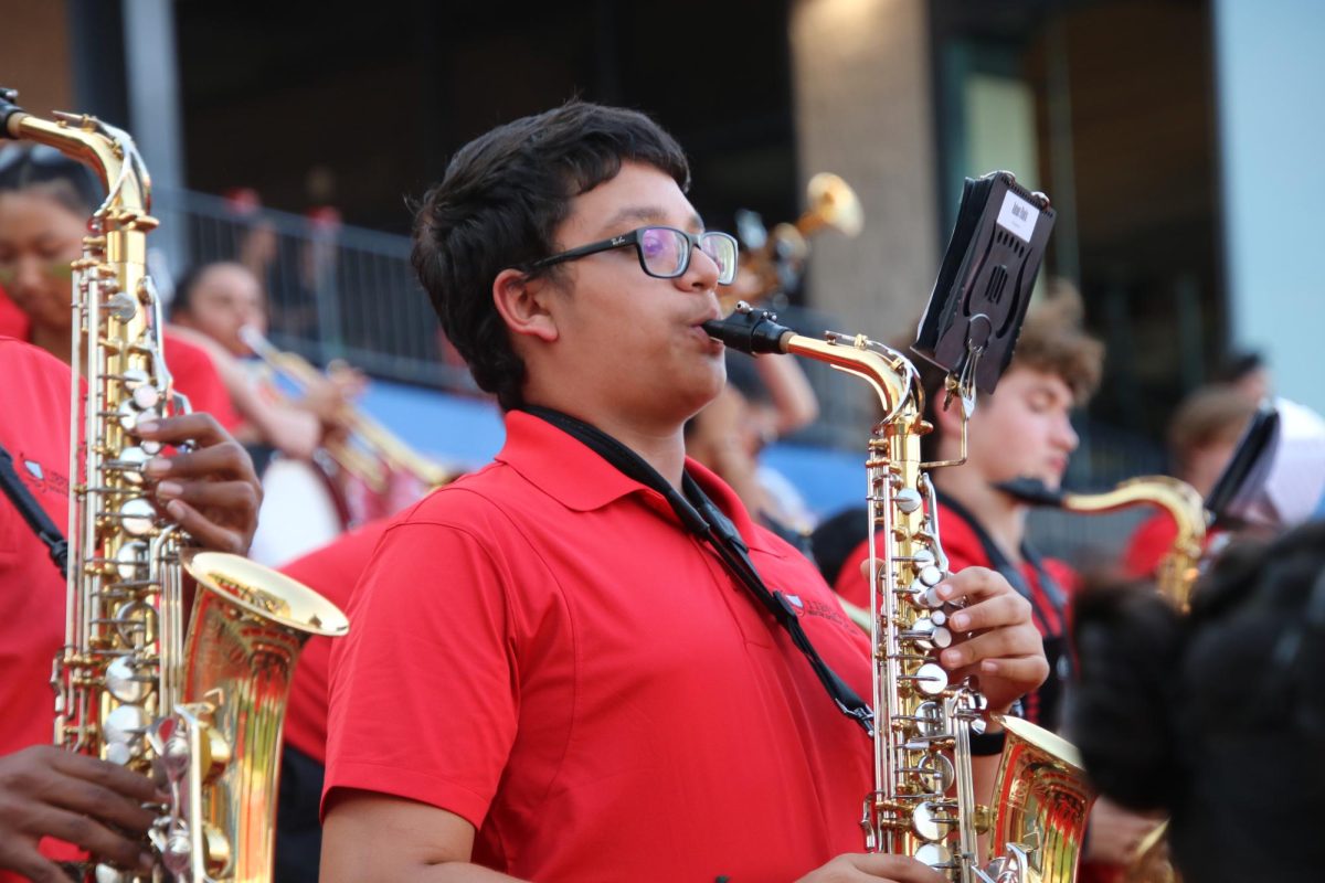 Able to wear their polo shirts at a football games when the temperatures are still high, saxophone players and the rest of the band will be in full contest uniforms for the Marching Band Showcase. 