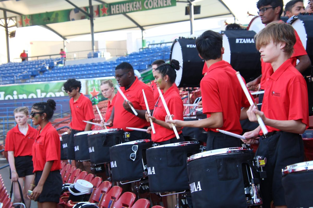 Helping to get things started at Toyota Stadium, the percussion section establishes a beat with the rest of the band soon joining in. 