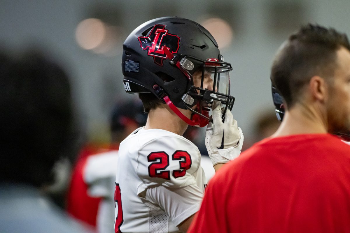 Halfway+through+their+season%2C+Redhawk+football+is+looking+to+come+out+with+a+win+Friday+against+Wakeland.+The+team+is+still+suffering+from+injuries%2C+but+will+have+few+players+returning+Friday+including+starting+quarterback+Jacob+Nickell.+
