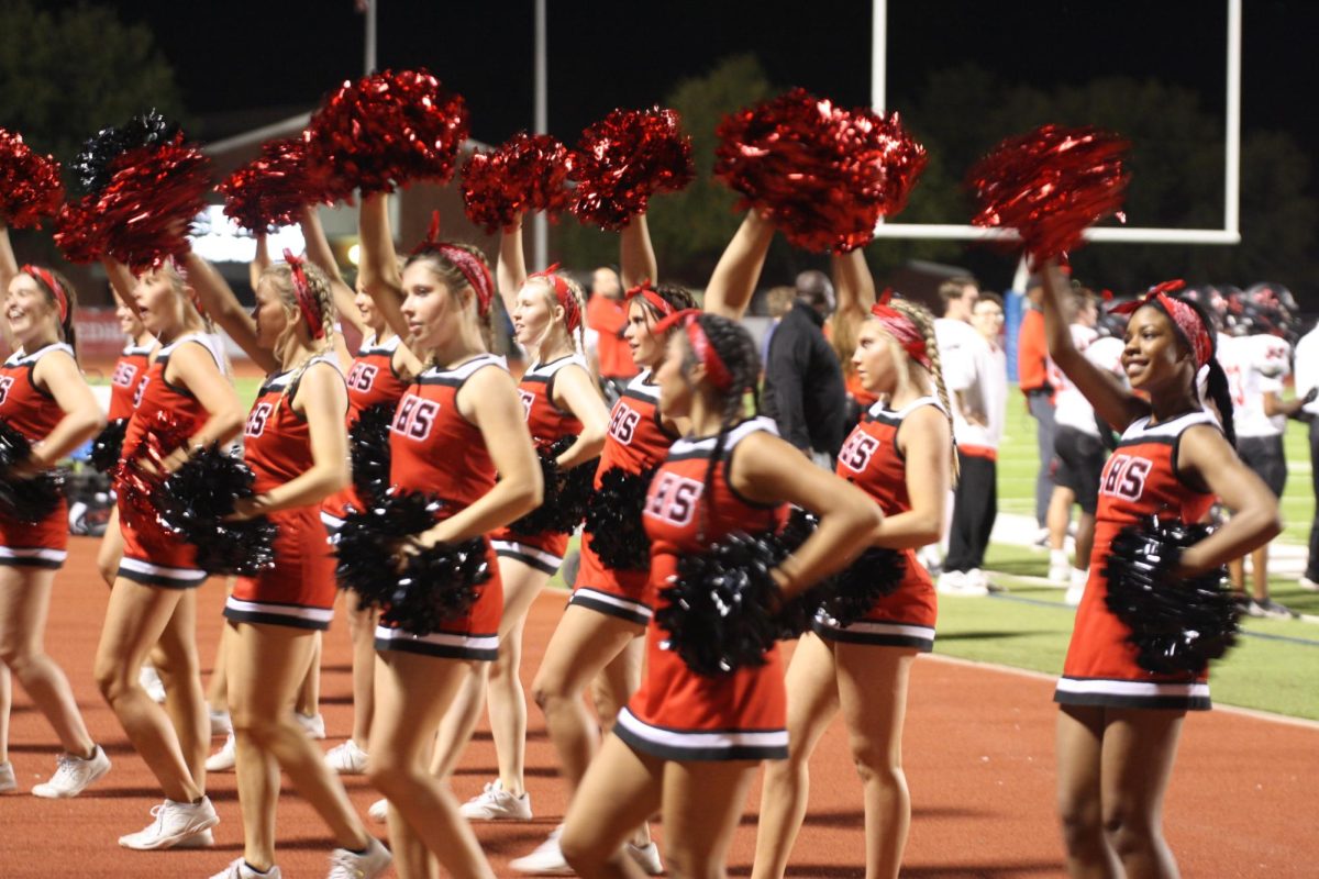 Redhawks+cheerleaders+take+on+the+UIL+showcase+on+Thursday%2C+along+with+all+of+the+other+Frisco+ISD+teams.+While+the+competition+does+not+happen+until+January%2C+the+showcase+gives+the+cheerleaders+a+chance+to+practice+their+performance.