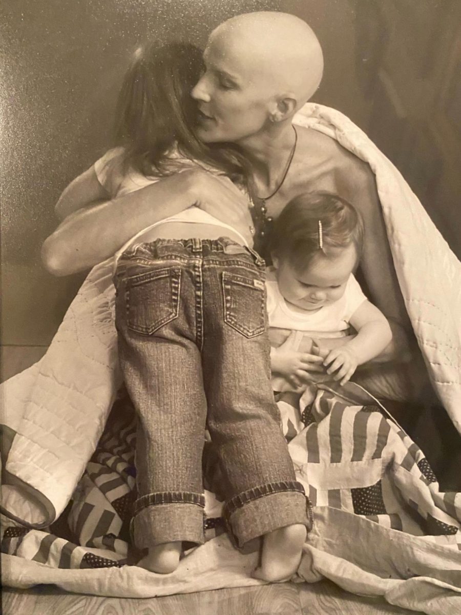 Leslie Reid is pictured above holding her two daughters, Reilly and Ryan. I live life to its fullest, don’t sweat the small stuff, and remain loyal to our family and friends, Leslie said.