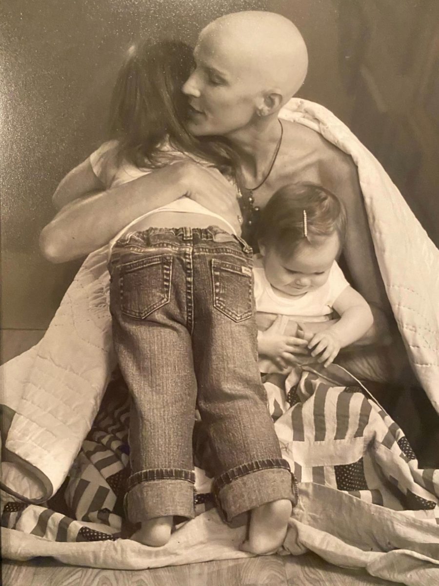 Leslie Reid is pictured above holding her two daughters, Reilly and Ryan. "I live life to its fullest, don’t sweat the small stuff, and remain loyal to our family and friends," Leslie said.