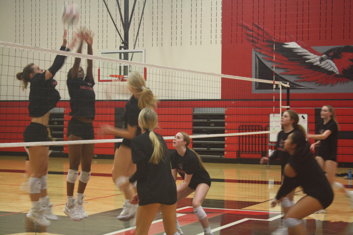 After+a+sweep+against+Heritage+on+Friday%2C+the+volleyball+team+looks+to+defeat+the+Memorial+Warriors+Tuesday.+The+last+match+was+close+against+Memorial%2C+with+the+Redhawks+only+winning+by+one+set.+