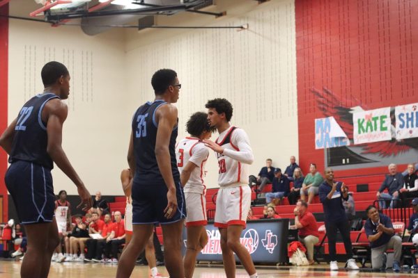 The boys’ basketball team seeks to notch their first win in District 11-5A competition over winter break. The Redhawks will travel to Heritage  Friday at 7:15 p.m. before taking a break from conference play for a game against Highland Park on December 28th, closing out their winter break slate with a home game against Independence.