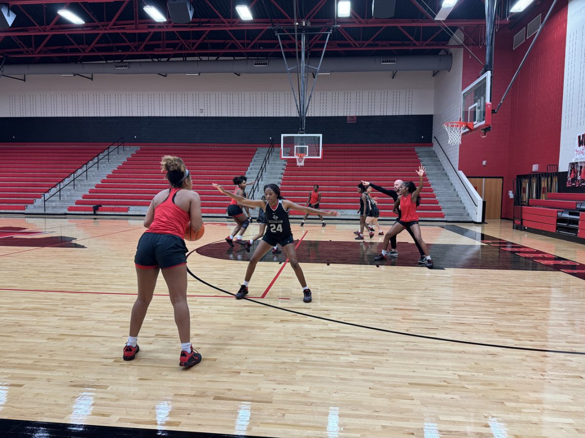 Despite losing their season opener to Panther Creek, the girls' basketball team is ready to take on their new season