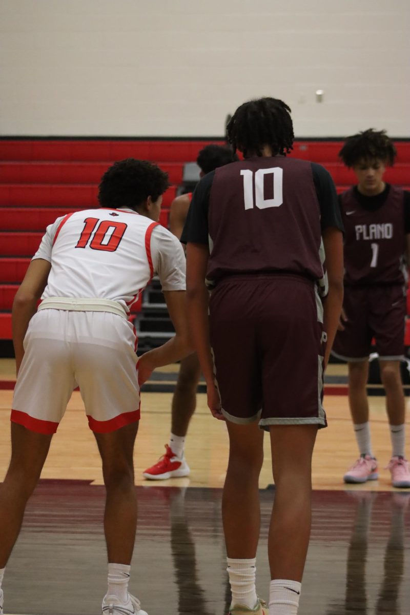Its 10 and 10, senior Emory Williams and Wildcat Jack Burley, stand side by side as they stand ready to play,, waiting on the result of a free throw. 