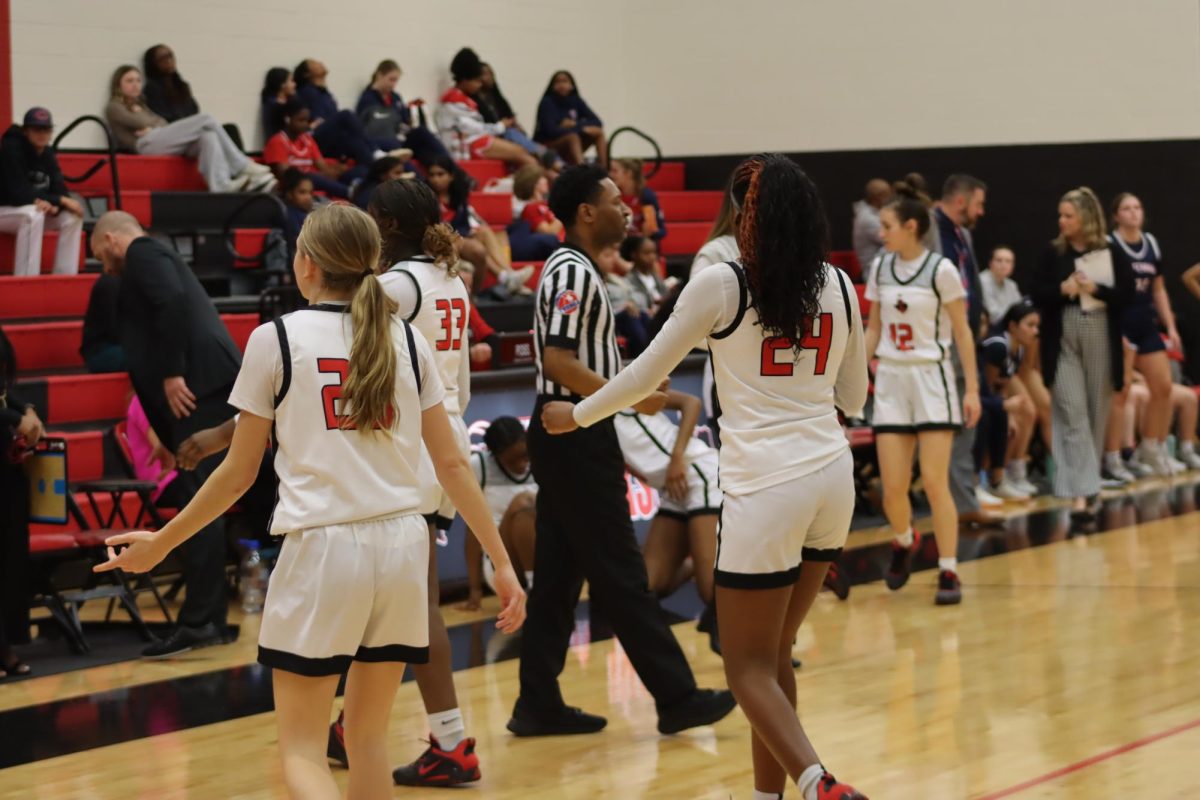 Girls basketball is now 2-0 in district play after a win over Centennial Monday.  The Redhawks scored 63 points, with each athlete rosterd scoring.