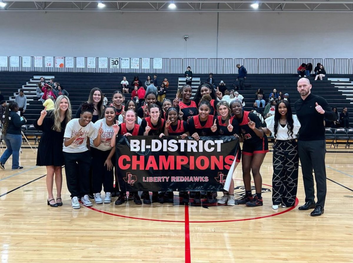 After+a+perfect+district+season%2C+the+girls+basketball+team+continued+their+win+streak+into+the+first+round+of+playoffs.+The+Redhawks+defeated+Creekview+in+their+first+round+on+the+road+to+state.