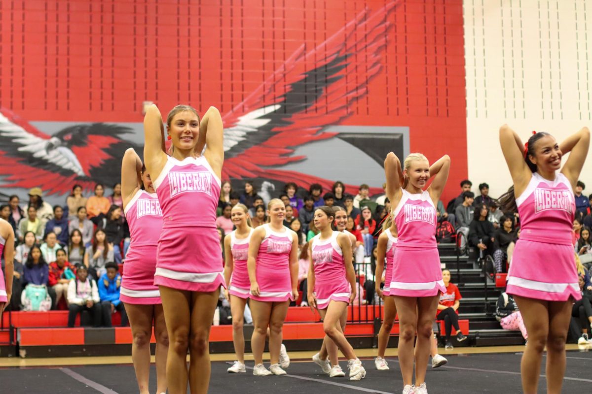 In the Valentines spirit, cheerleaders wore pink uniforms for the rally. The cheer team performed a special routine for the rally.