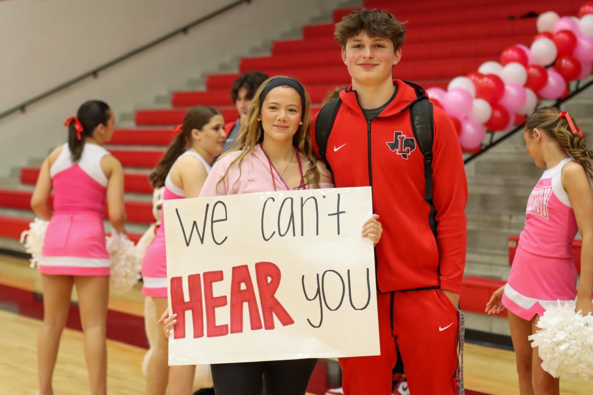 Student Council has students, such as senior Bailey Tyler, serve as spirit leaders to keep the pep going during pep rallies. Junior Jacob Nickell, a member of the varsity basketball team, had the chance to highlight the team during the rally.