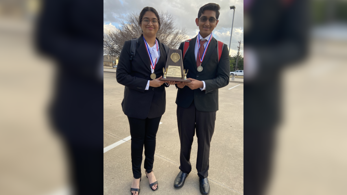 Pictured+above+are+CX+%28Policy%29+debaters%2C+Mahi+Kosuri+%28left%29+and+Vihaan+Raizada+%28right%29.+Liberty+debaters+won+best+in+the+district+%281st+place%29+and+are+now+state+bound.+