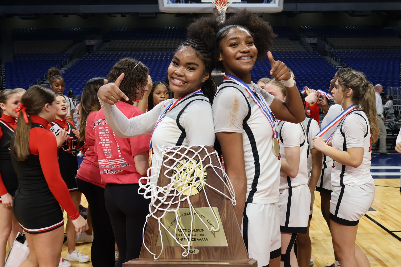 Top+sports+moments+of+2023-24%3A+%231+Second+half+rally+leads+girls+basketball+team+to+its+second+straight+state+title