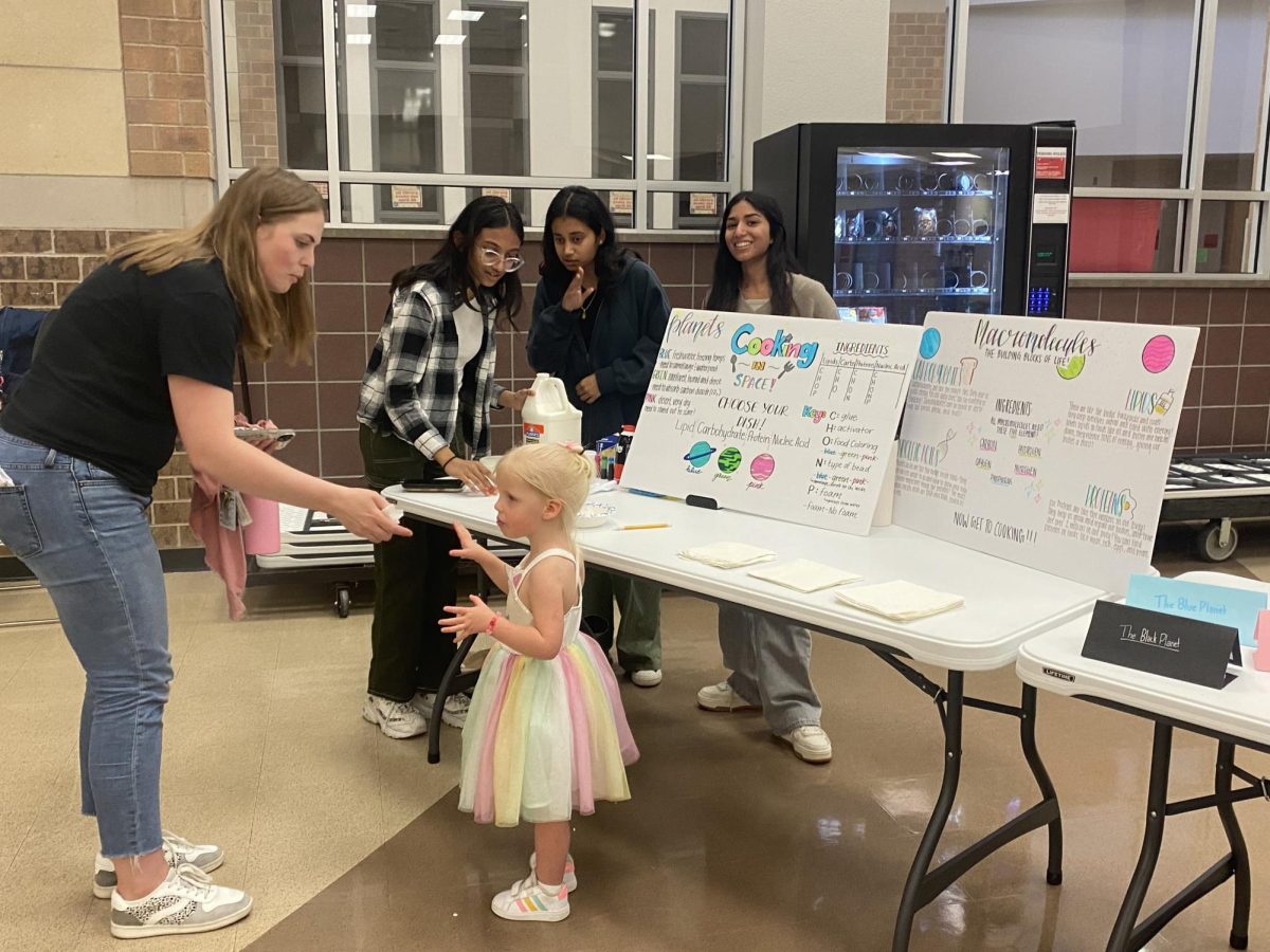For Family Science Night, students create booths that present science related topic in a fun but easy to understand way.