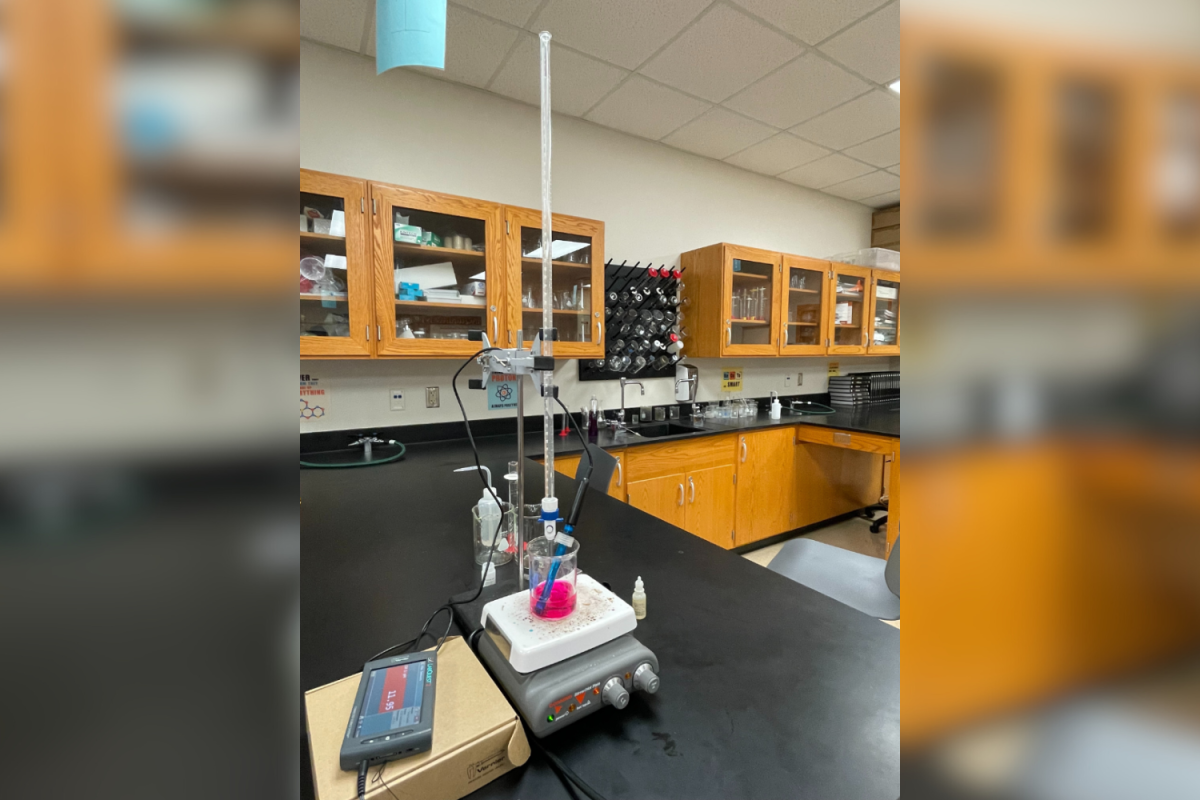Students in AP Chemistry are doing a classic lab: titration. This process consists of using acids and bases to find a balance of ions which students have to find using an indicator which gives the solution its color. 