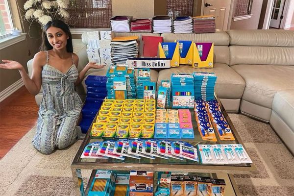 Co-founder and owner of Supplying Smiles: Riti Patel shown next to school supplies that were donated  to numerous schools across the DFW area.