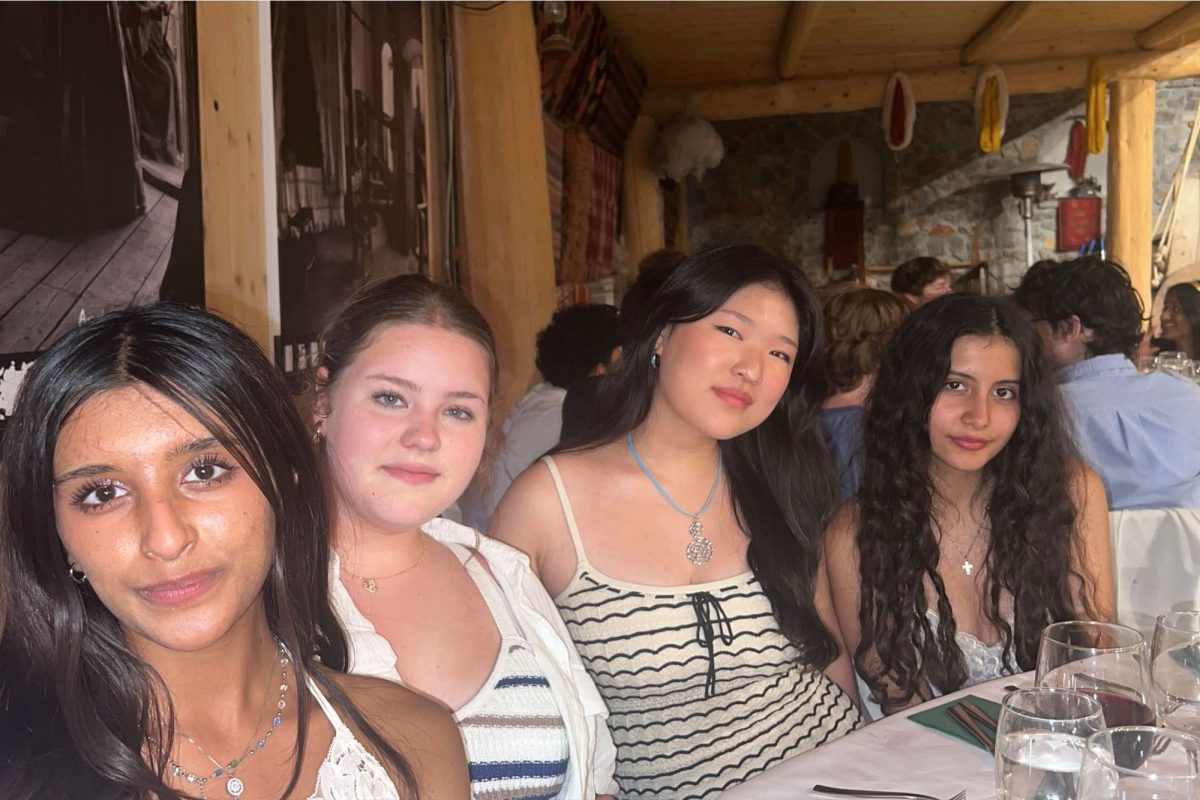 In Athens, Greece select students had the opportunity to participate in a Greek Evening. This activity consisted of dancing, eating, and smashing plates. Pictured are Brooke Granberry, Rihanna Gopinathan, Christine Han, and Olivia Chamberlain. 