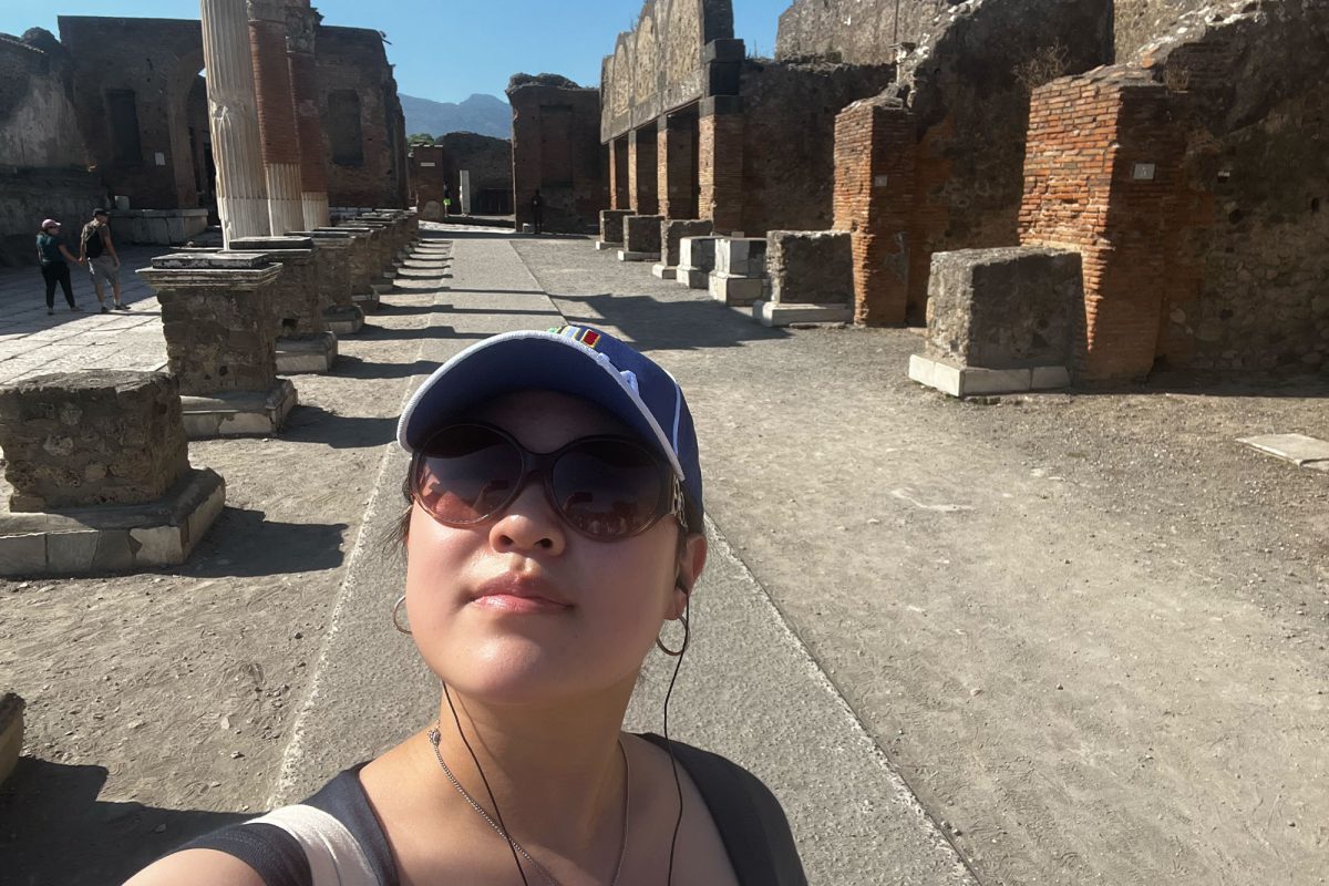 While learning about the architectual site in Pompeii, senior Christine Han snaps a selfie among the ruins of a once flourishing civilization. 