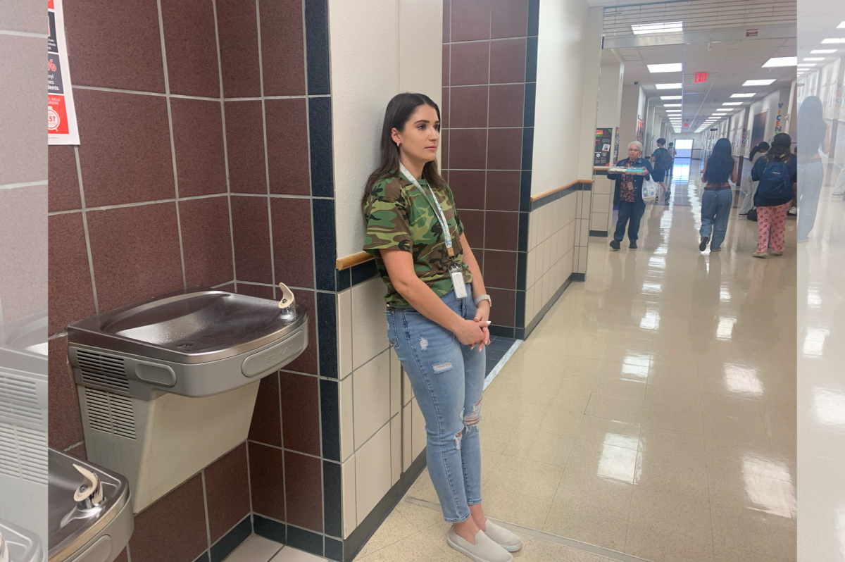 Even teachers are participating in the dress up theme for Thursday’s football game with RAIL Academy teacher Peri Pattie sporting a camo t-shirt while on duty during advisory.