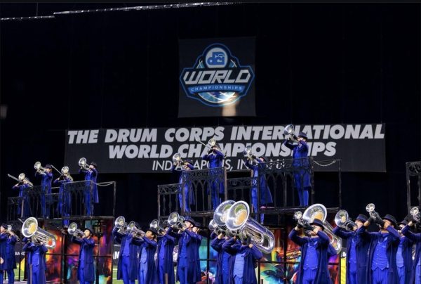 Former Redhawks didn't stop performing just because they graduated high school. Three former Redhawks, Josh Graves, Caroline Wolfe, and Isabelle Raade are participating in prestigious DCI drum corps. 