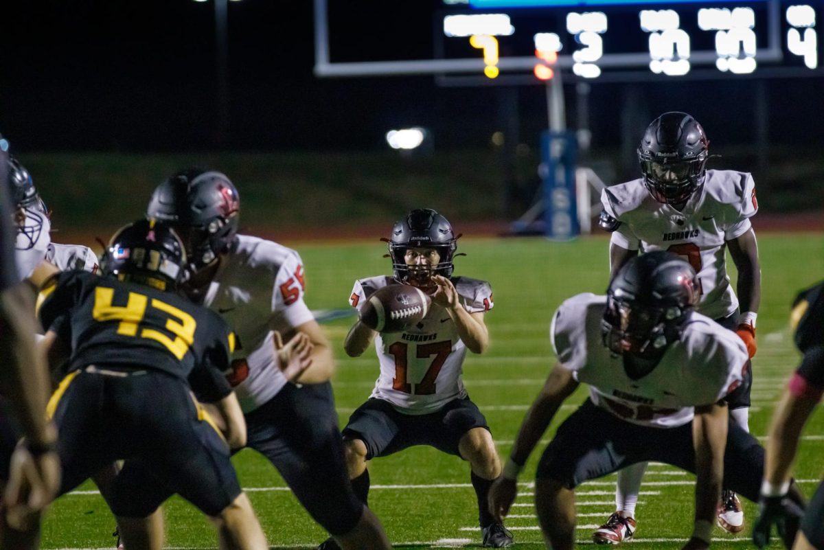 Landon Reygadas receives the snap from center. 