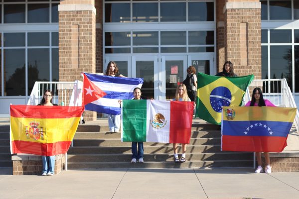 To honor their Hispanic identities, students in the dance department took part in the annual flag-holding picture organized by dance teacher Nicole Nothe.