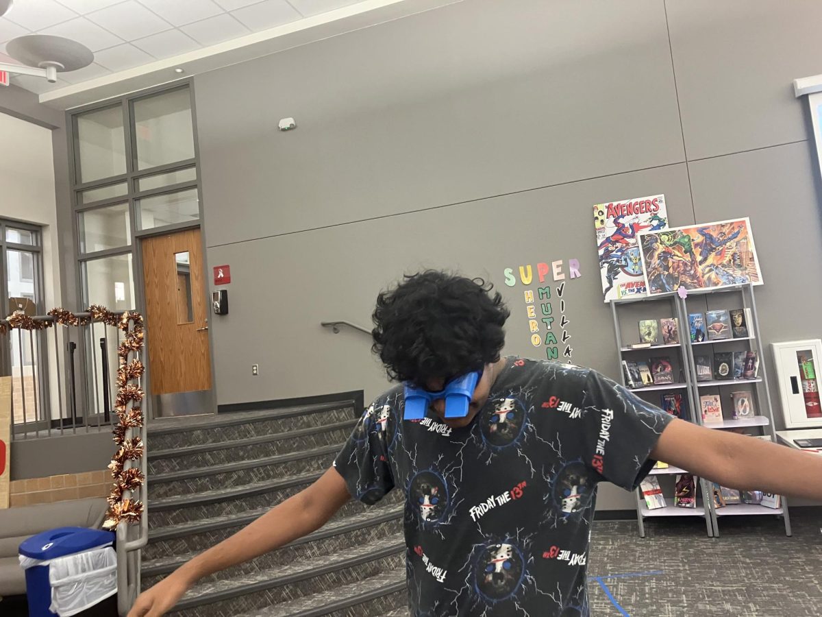  Junior Sirish Shabash attempts to follow a path while wearing goggles that give the sense of the world being upside down in order to test his perception
