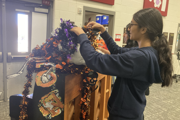Falloween might be at the end of the week, but for orchestra officers like seniors Shriya Satish and Saanvi Patel, the decoration process begins days before.