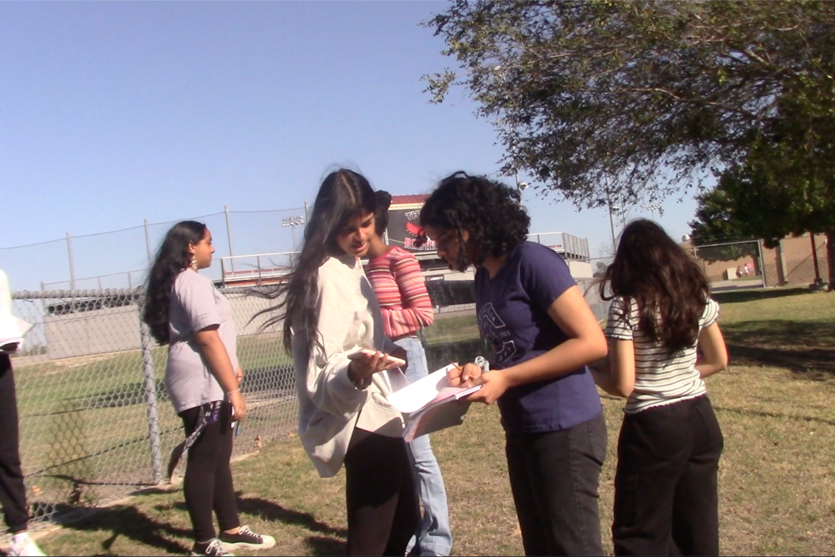 Students get a change of pace taking their learning outside as AP Human classes for a scavenger hunt. “I think this assignment is fun because we get to explore," freshman Dalvin Dzikiti said.