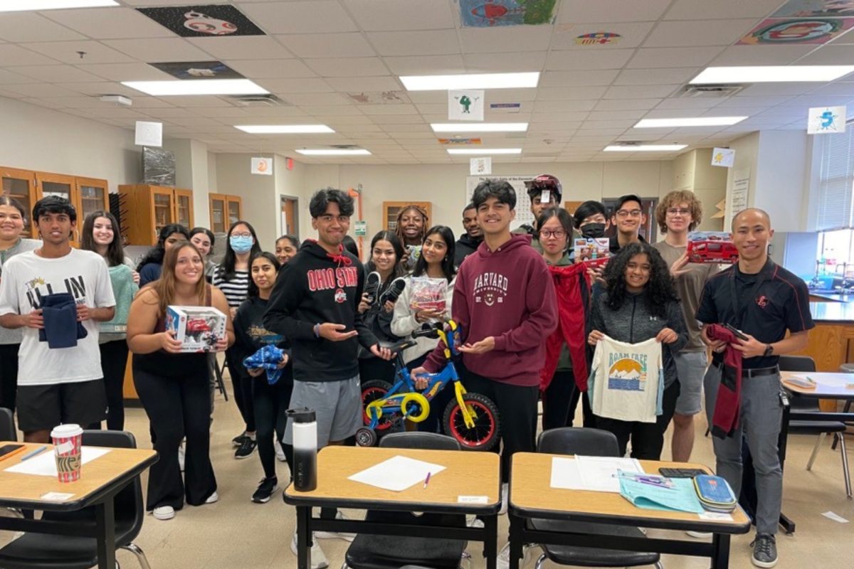 The Angel Tree donations program allows students and teachers to bring holiday joy to families in need by adopting angels and fulfilling their gift wishlists (photo via Chris Ham). 