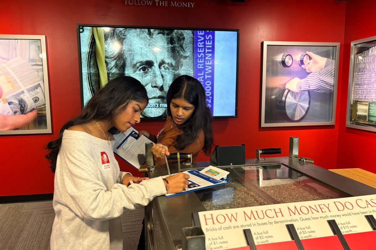 Students were tasked with a scavenger hunt around the exhibition at the Federal Reserve Bank.