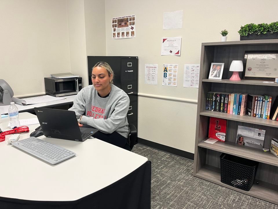 First-year teacher and JV volleyball coach Emery Judkins brings her passion for business education and volleyball to Liberty High School