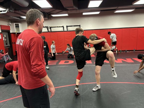 As juniors Nolan Koons and Max WIllimas practice, head coach Justin Koons looks on as the two prepare for the regional meet on Friday and Saturday in Addison. Nolan Koons finished 4th at the District 8-5A tournament and is an automatic regional qualifier, while Willimas finished 5th and is an alternate. 