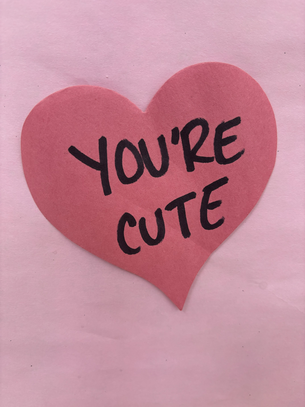 Students and staff left heart shaped messages on a poster in the rotunda for Valentine's Day. 