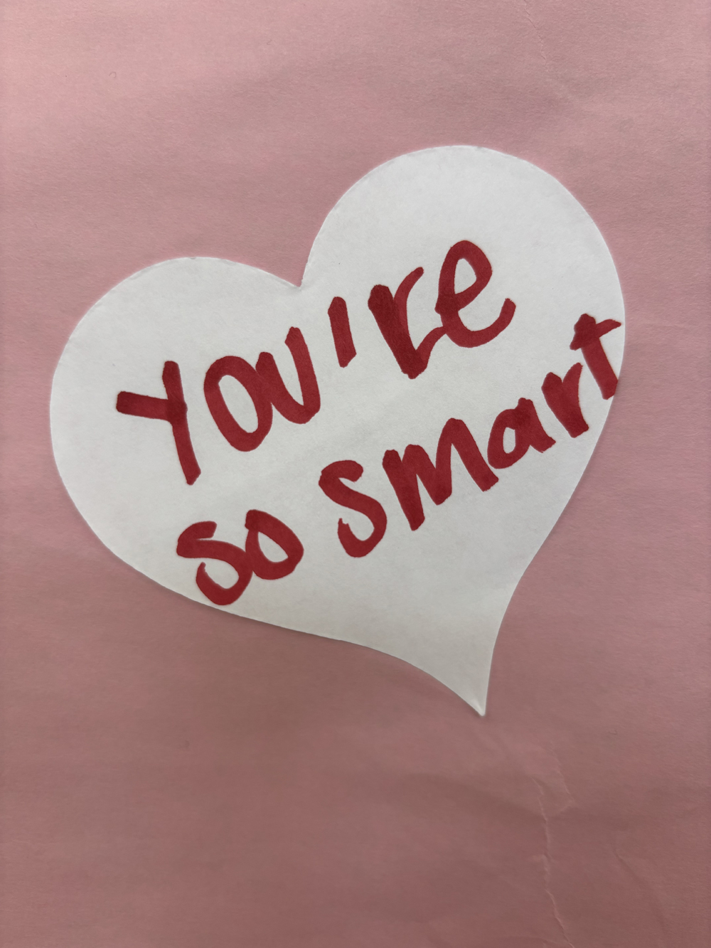 Students and staff left heart shaped messages on a poster in the rotunda for Valentine's Day. 