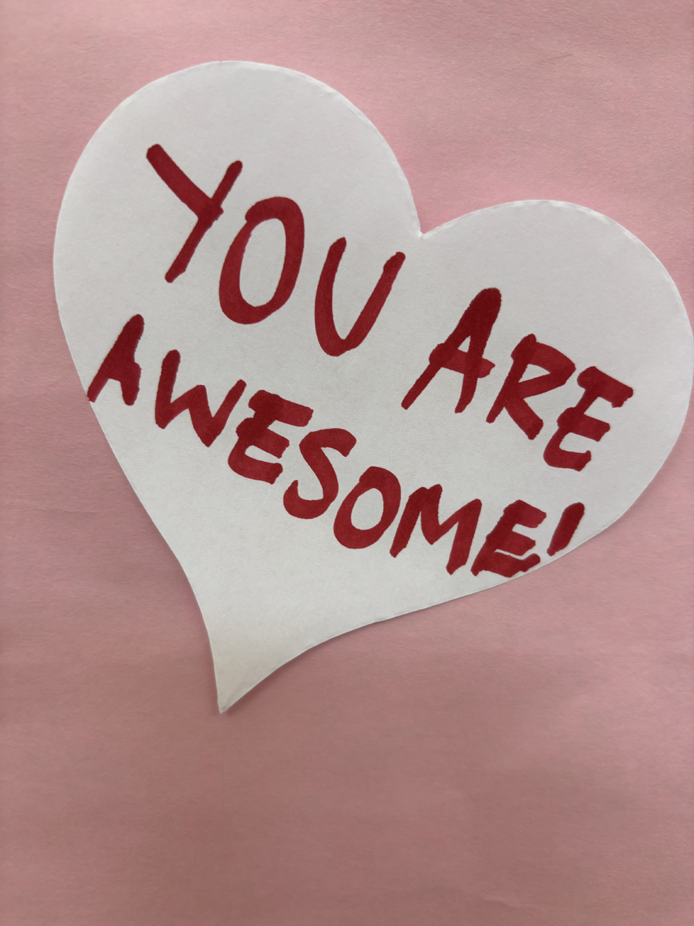 Students and staff left heart shaped messages on a poster in the rotunda for Valentine's Day. 