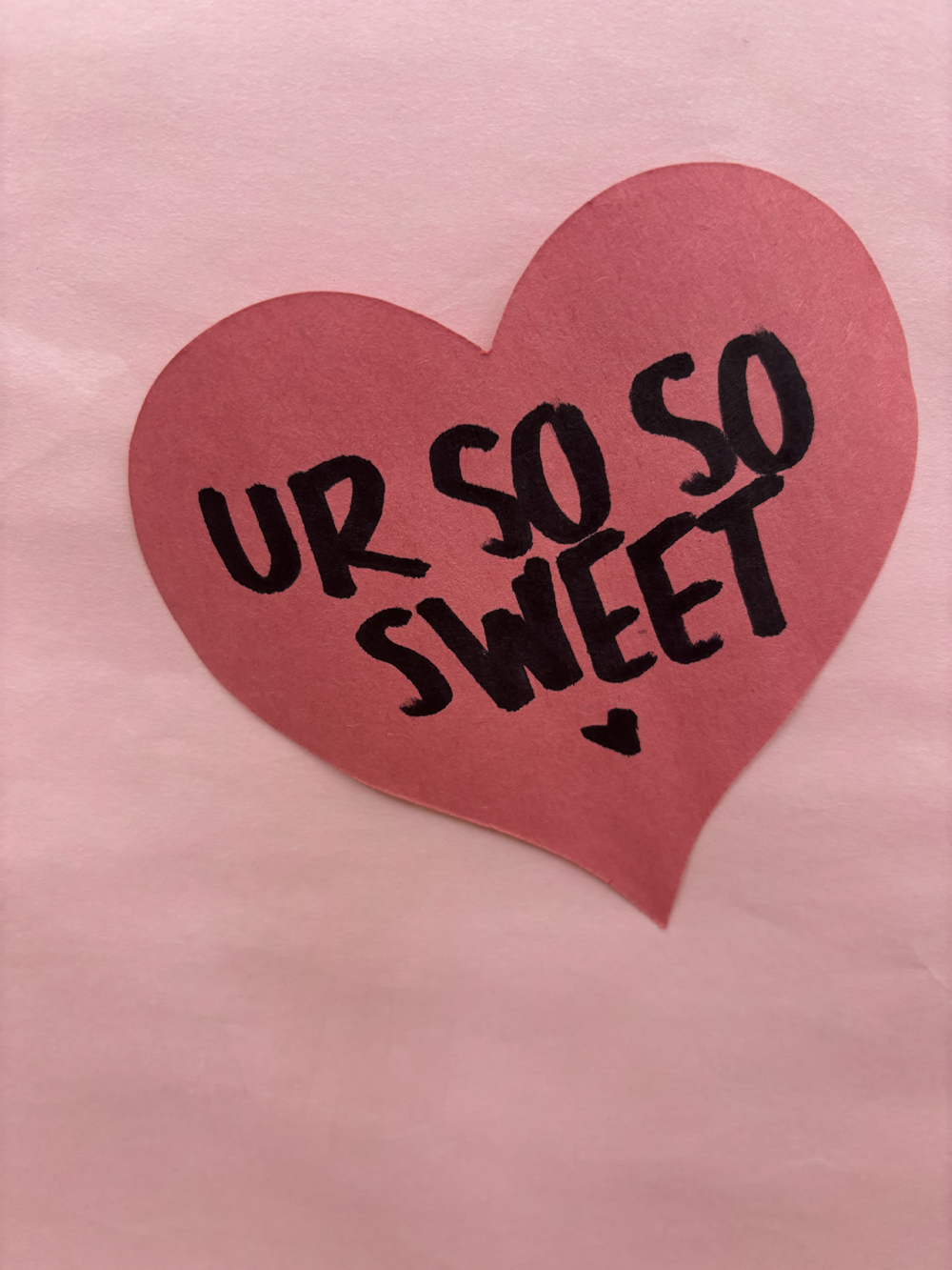 Students and staff left heart shaped messages on a poster in the rotunda for Valentine's Day. 