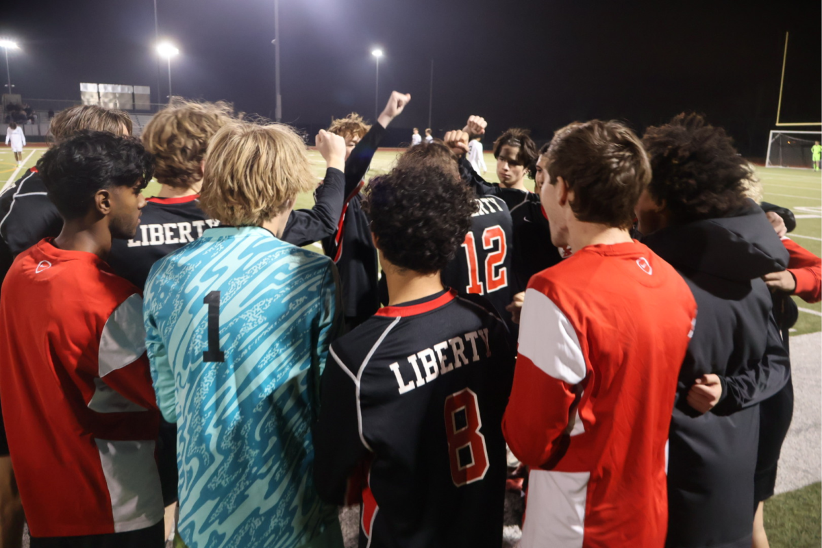 Boys' soccer pictured breaking it out during half time.